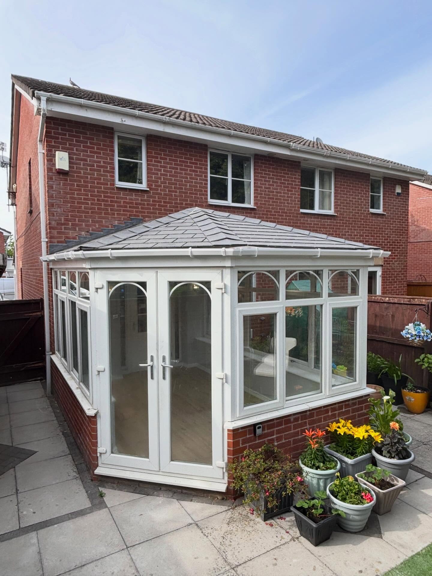 Conservatory roof conversion with hand cut timber roof